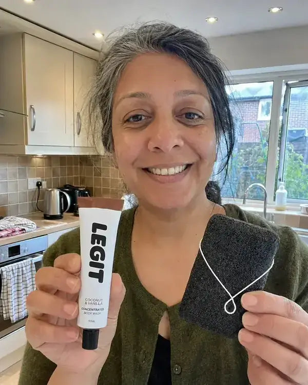 Priya holding a tube of Legit
