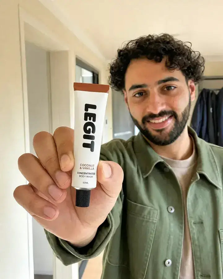 Andrew holding a tube of Legit